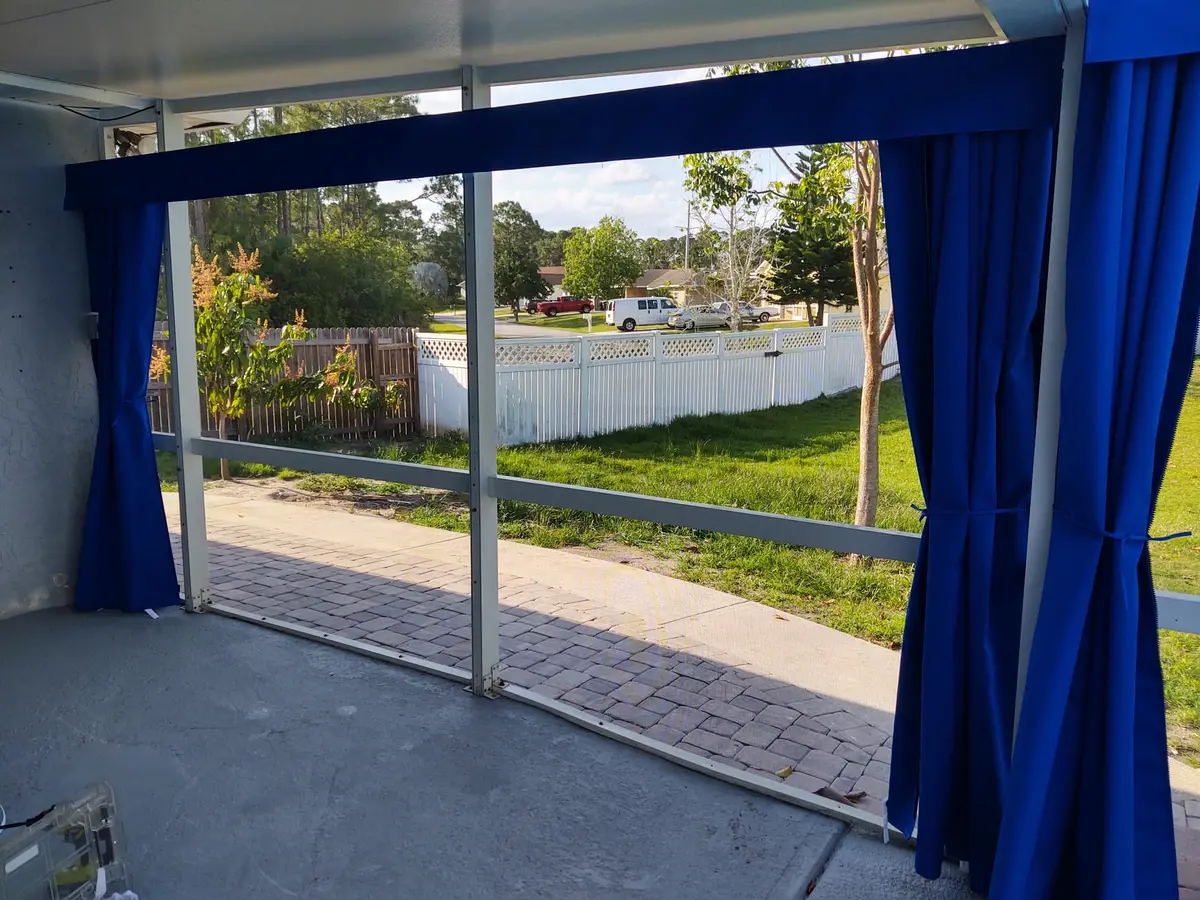 Blue curtains in lanai area