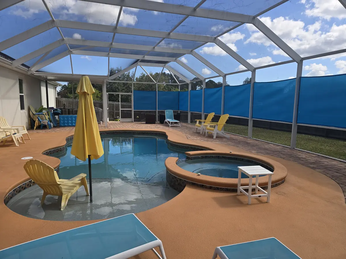 UV-filtering privacy panels for Naples golf course home pool enclosure