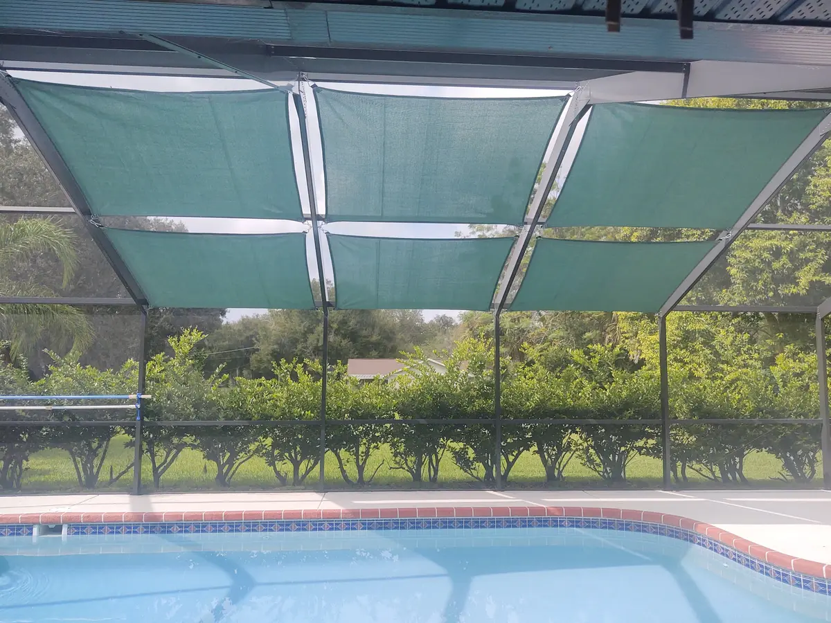 Tan shade sail in lanai area